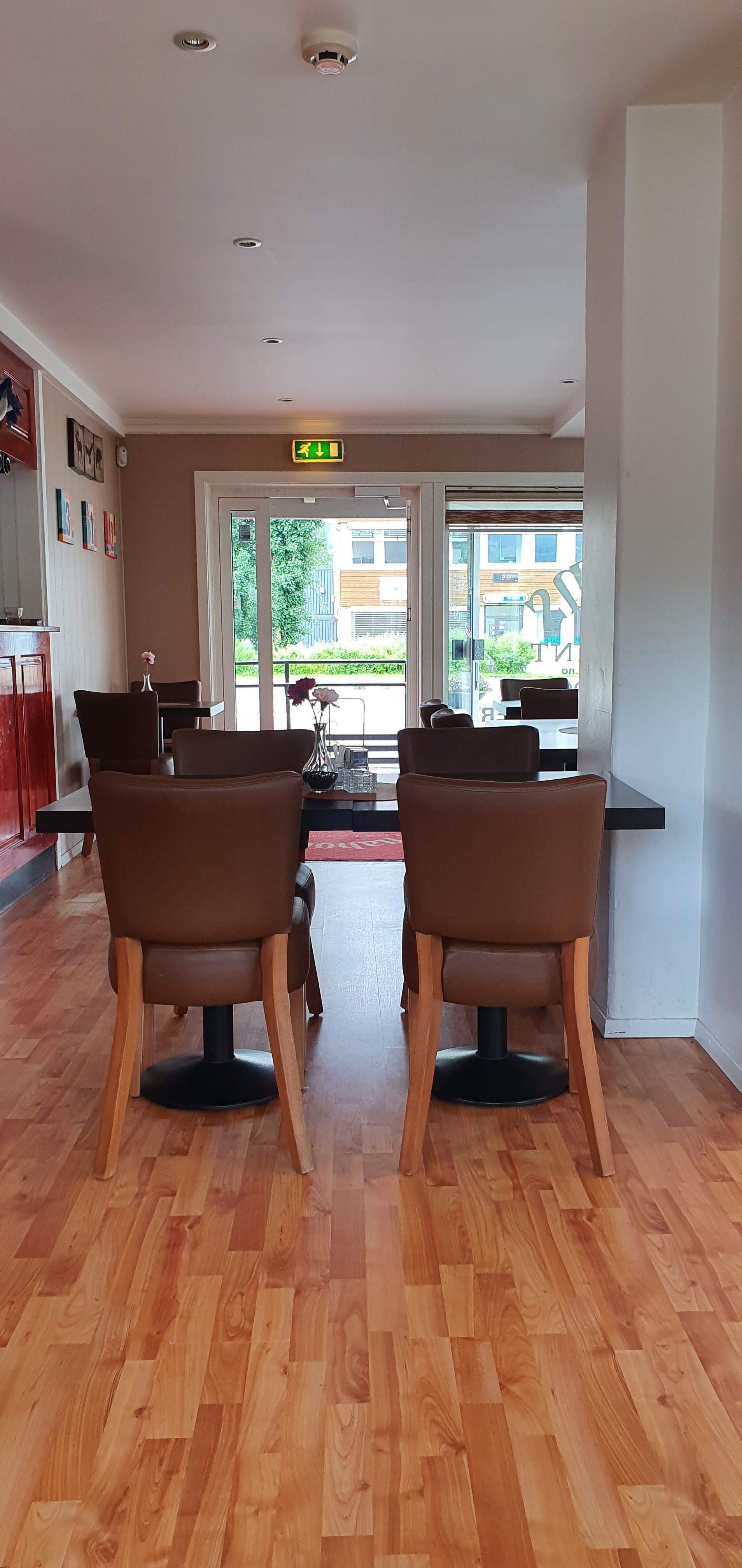 Naboen restaurant AS